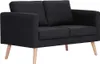 A black two-seater sofa with wooden legs, shown from the front.