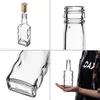 A collage of four images showing a small glass bottle from different angles, including a hand holding one. Produktbild-Vorschau