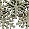 A close-up view of several glittery snowflake decorations. Produktbild-Vorschau