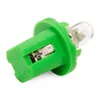 A close-up studio shot of a single automotive light bulb with a green plastic base against a white background. Produktbild-Vorschau