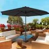 A patio scene with outdoor furniture and a large umbrella. Voir les images du produit