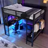 A loft bed with a desk and closet space, featuring LED lighting. Produktbild-Vorschau