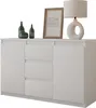 A white sideboard with decorative items on top, including bottles, a framed picture, and a lamp. Náhled obrázku produktu