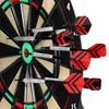 Close-up view of darts embedded in a dartboard. Produktbild-Vorschau