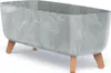 A planter with a marble-like gray finish and wooden legs, shown against a white background. Náhled obrázku produktu