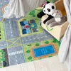A children's play rug with a city street design, featuring toy animals and a play tent. Produktbild-Vorschau