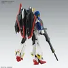 A rear side view of a white, red, blue, and black robot model with a gun. Náhled obrázku produktu