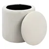 A white cylindrical ottoman with its lid slightly ajar, revealing a black interior, is shown against a white background. Náhled obrázku produktu