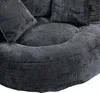 Close-up view of a dark gray, textured fabric sofa with cushions. Podgląd zdjęcia produktu
