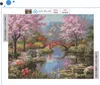 A diamond painting kit depicting a serene Japanese garden scene with a bridge over a pond and cherry blossoms. Podgląd zdjęcia produktu