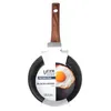 A frying pan with a fried egg on it, presented on a white background with packaging. Podgląd zdjęcia produktu