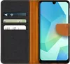 A flip case for a smartphone is shown open, revealing card slots and the phone screen. Podgląd zdjęcia produktu