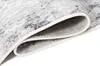 A close-up of a rug, showing the texture and the rolled edge. Produktbild-Vorschau