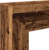 A close-up view of a wooden fireplace surround with a rustic, weathered appearance. Podgląd zdjęcia produktu