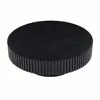 A black, round coffee table with a fluted base, shown from a slightly elevated angle against a white background. Produktbild-Vorschau