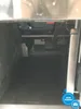 Interior view of a coffee machine, showing the brewing unit and drip tray area. Produktbild-Vorschau
