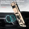 A gold phone case with a ring holder is shown attached to a magnetic car mount inside a car. Produktbild-Vorschau