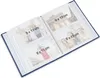 An open photo album showing multiple pages with photos and text overlays. Anteprima dell’immagine prodotto
