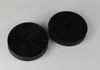 Two black charcoal filters on a white background. Produktbild-Vorschau