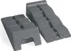 Two gray plastic leveling wedges for vehicles, shown on a white background. Náhled obrázku produktu