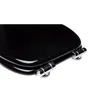 A close-up, angled view of a black toilet seat with chrome hinges against a white background. Náhled obrázku produktu
