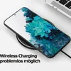 A smartphone case is shown on a wireless charging pad, with a laptop in the background. Náhľad obrázku produktu