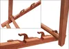 A close-up view of a wooden structure with hooks. Produktbild-Vorschau
