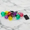 A string of colorful LED light bulbs with a solar panel. Produktbild-Vorschau