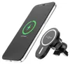 A black smartphone is shown charging wirelessly next to a black car phone holder. Náhled obrázku produktu