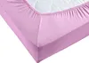A close-up view of a pink fitted sheet on a mattress. Produktbild-Vorschau
