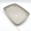 A gray plastic tray with a measuring tape next to it. Produktbild-Vorschau