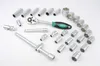 A collection of socket wrenches and accessories laid out on a white background. Produktbild-Vorschau