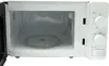 The interior of a white microwave oven is shown with the door open. Produktbild-Vorschau