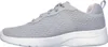 A side view of a gray Skechers Dynamight 2.0 sneaker with a white sole. Produktbild-Vorschau