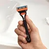 Gillette Fusion5 Rasierer + 11 Klingen Produktbild-Vorschau 5