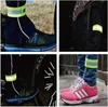 Reflexní páska na běhání na kole suchý zip 4cm oranžová Náhled obrázku produktu 2