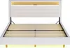 A white bed frame with a slatted base and a headboard with integrated LED lighting. Anteprima dell’immagine prodotto