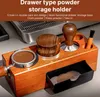 A wooden organizer for coffee accessories, including a portafilter, tamper, and brush, with a small drawer. Náhled obrázku produktu