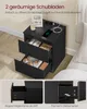 A black nightstand with two drawers open, displaying items inside. The top of the nightstand has a phone charging and a decorative item. Below the main image are two close-up shots of the drawer mechanism and handle. Produktbild-Vorschau