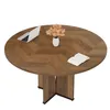 A round wooden table with a laptop, a vase with flowers, and an open book on it, set against a white background. Anteprima dell’immagine prodotto