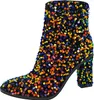 A single black ankle boot covered in colorful sequins. Produktbild-Vorschau