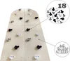 A wooden climbing wall with black and white climbing holds, shown with a close-up of the holds and a graphic of logs. Voir les images du produit