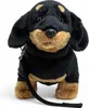 A stuffed dachshund toy with a leash. Podgląd zdjęcia produktu