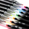 A close-up, angled view of multiple marker pens with their caps off, showing the colored tips and ink lines on a white surface. Produktbild-Vorschau