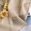 Juego de 2 cortinas transparentes con ojales, color beige Vista previa de la imagen del producto 5