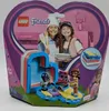 The image shows the packaging of a LEGO Friends Olivia's Summer Heart Box set. The packaging is heart-shaped and features illustrations of children, the LEGO Friends logo, and a depiction of the toy set. Anteprima dell’immagine prodotto