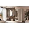 A bedroom scene featuring a wardrobe, dressing table, and bed, with a large window overlooking a natural landscape. Produktbild-Vorschau