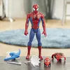 A Spiderman action figure with accessories on a wooden table. Náhled obrázku produktu
