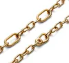 A close-up shot of a gold chain bracelet against a white background. Voir les images du produit