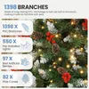 A close-up view of a decorated artificial Christmas tree with text overlays detailing its features. Produktbild-Vorschau